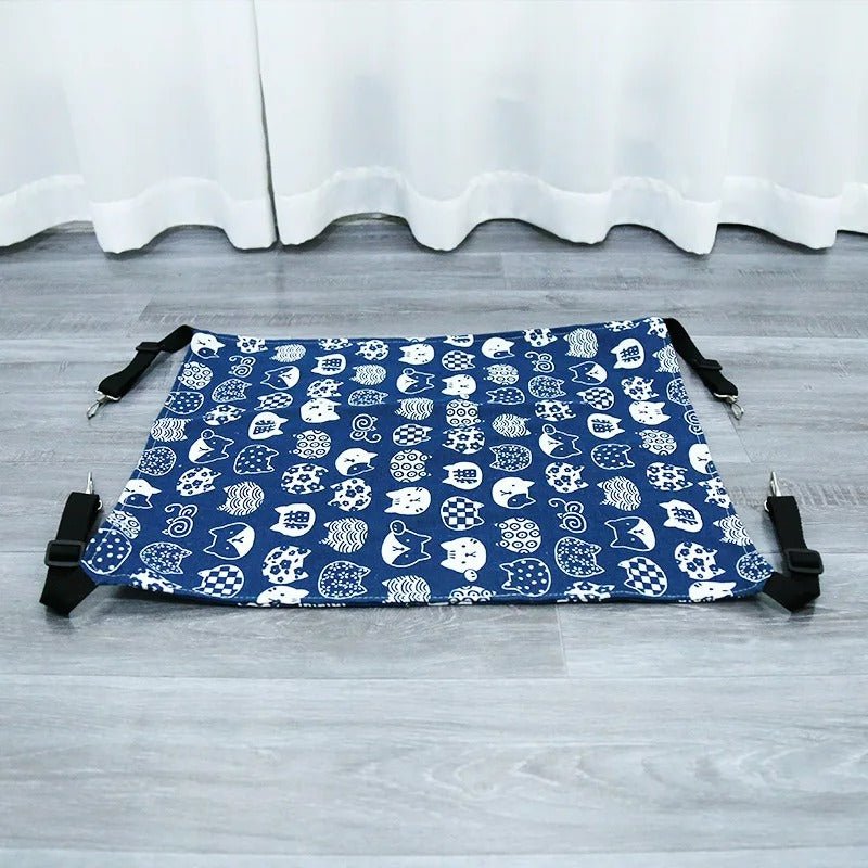 hamac chat fond bleu